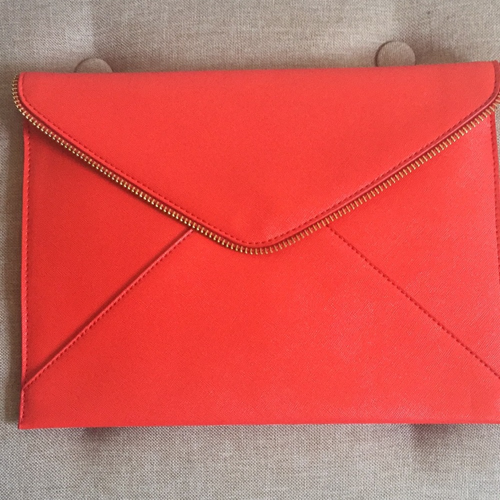 Red saffiano envelope clutch bag.